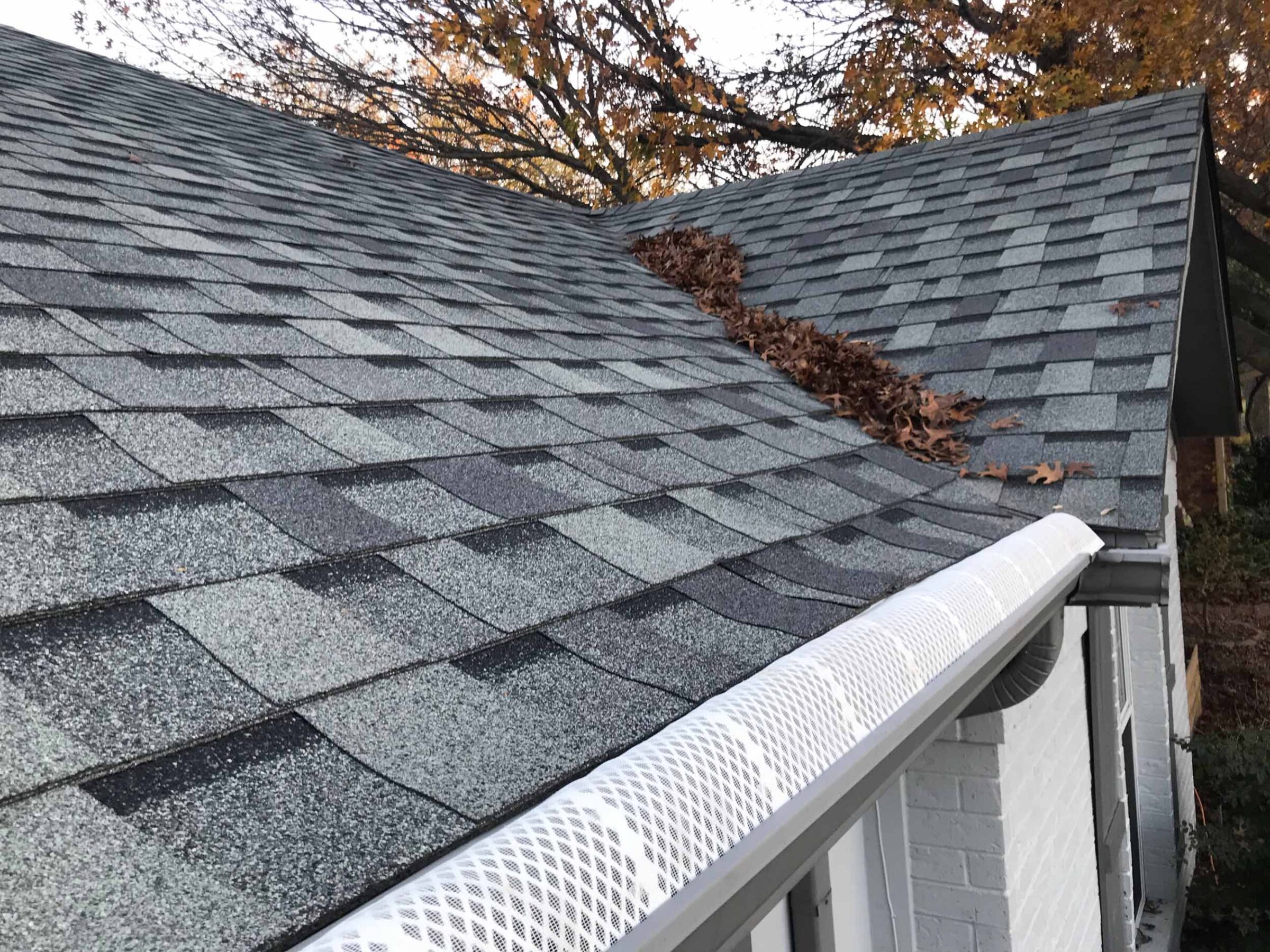 surface tension gutter hood on home gutters