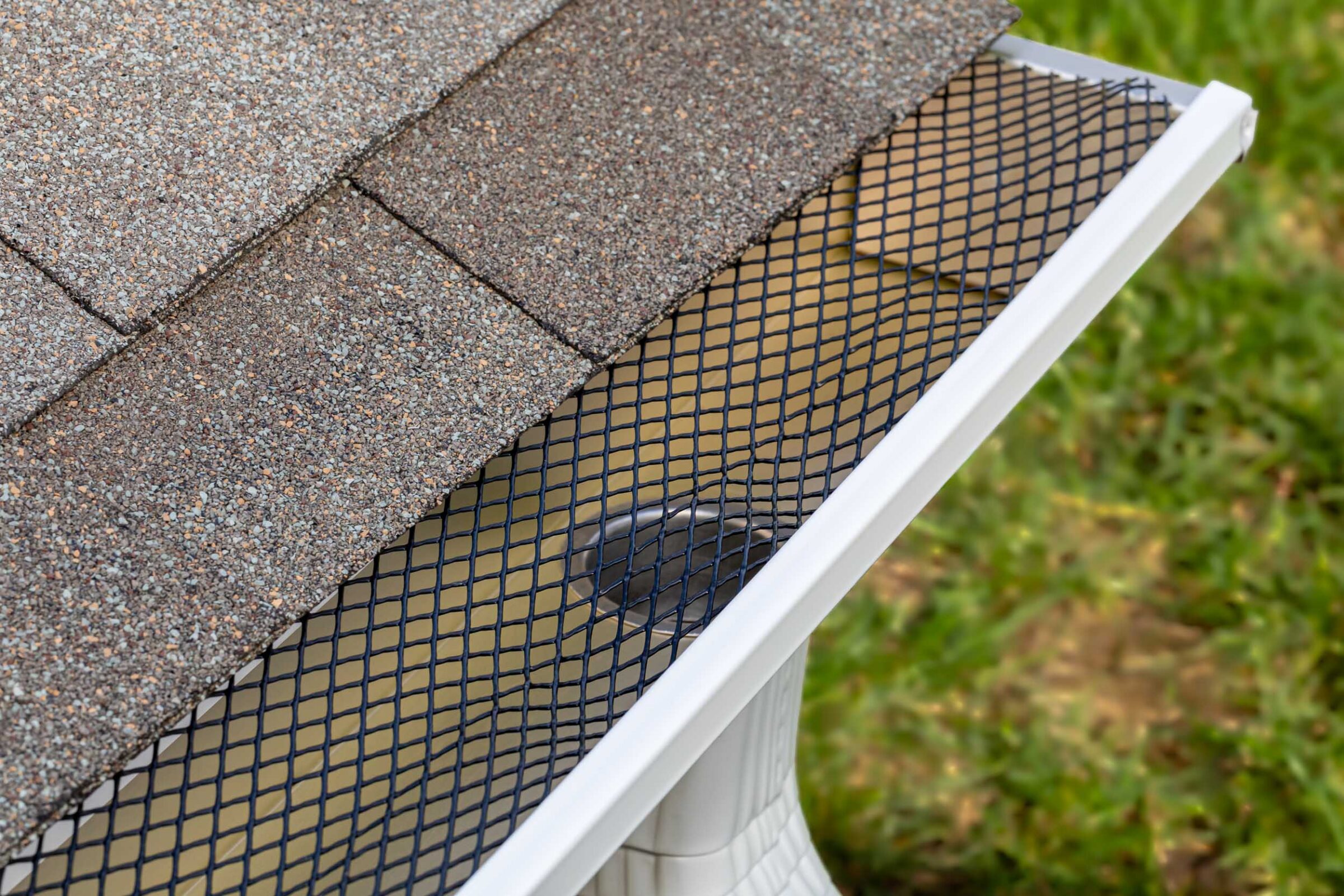 mesh gutter guard on home gutters